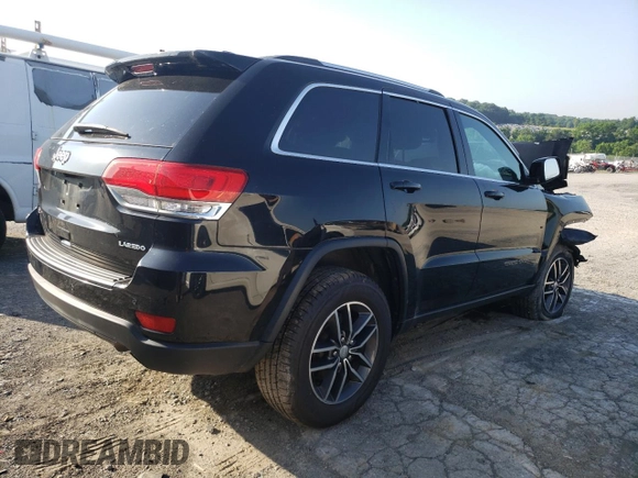 2018 Jeep Grand Cherokee Laredo E with VIN 1C4RJFAG5JC487487, listed as a Copart auction lot 61838185 with 54,297 mi miles and Salvage title. Bid and sale history available at DreamBid. Image 3.