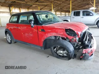 2012 MINI Hardtop with VIN WMWSU3C5XCT261853, listed as a Copart auction lot 49980285 with 110,638 mi miles and Salvage Title. Bid and sale history available at DreamBid. Image 4.
