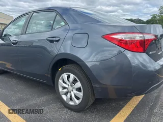 2014 Toyota Corolla L z VIN 2T1BURHE6EC077048, wystawiony jako Copart lot #62062695 z przebiegiem 199 669 mil mil oraz Czysty tytuł • Clean title. Historia ofert i sprzedaży dostępna na DreamBid. Obrazek 3.