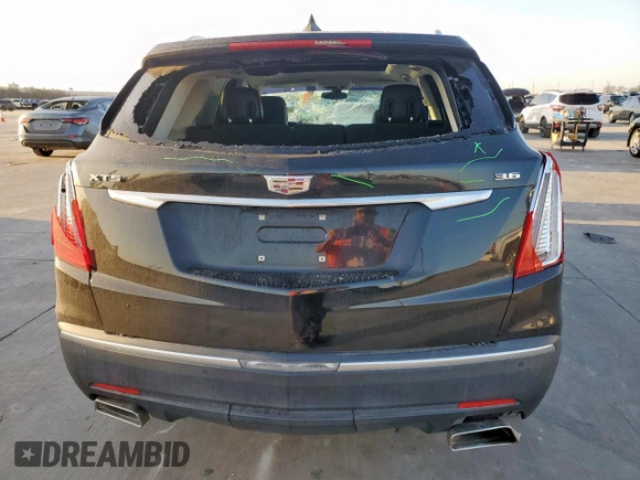 2017 Cadillac XT5 Luxury FWD with VIN 1GYKNBRS9HZ100304, listed as a Copart auction lot 48698755 with 93,407 mi miles and Salvage Title. Bid and sale history available at carsss.com. Image 6.