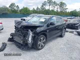2023 Mitsubishi Outlander ES z VIN JA4ARUAU2PU014515, wystawiony jako IAAI lot #42147345 z przebiegiem 43 489 mil mil oraz . Historia ofert i sprzedaży dostępna na DreamBid. Obrazek 18.