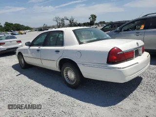 2000 Mercury Grand Marquis LS z VIN 2MEFM75W3YX689886, wystawiony jako Copart lot #54128735 z przebiegiem 54 819 mil mil oraz Szkoda całkowita • Salvage title. Historia ofert i sprzedaży dostępna na DreamBid. Obrazek 2.
