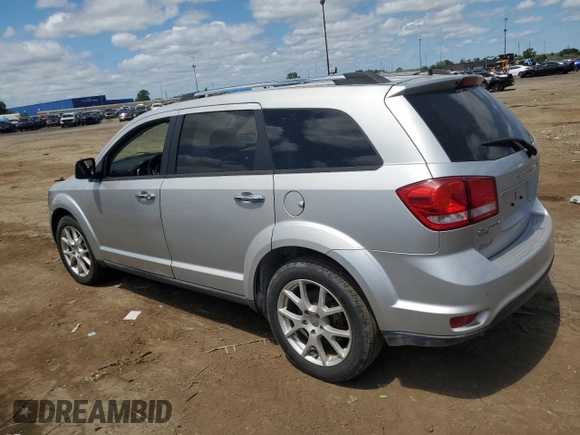 2013 Dodge Journey R/T with VIN 3C4PDDFG3DT606514, listed as a Copart auction lot 65601315 with 129,236 mi miles and Clean title. Bid and sale history available at DreamBid. Image 2.