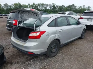 2012 Ford Focus SE with VIN 1FAHP3F29CL353872, listed as a IAAI auction lot 42528943 with Not provided miles and . Bid and sale history available at DreamBid. Image 4.