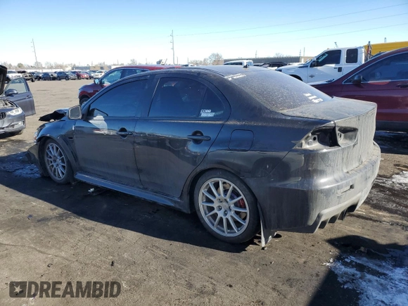 2010 Mitsubishi Lancer Evolution SE with VIN JA32W6FV8AU033981, listed as a Copart auction lot 87676155 with 150,901 mi miles and Salvage Title. Bid and sale history available at carsss.com. Image 2.