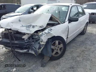 2000 Mazda Protege DX with VIN JM1BJ2221Y0208156, listed as a IAAI auction lot 41609657 with 435,304 mi miles and . Bid and sale history available at DreamBid. Image 6.