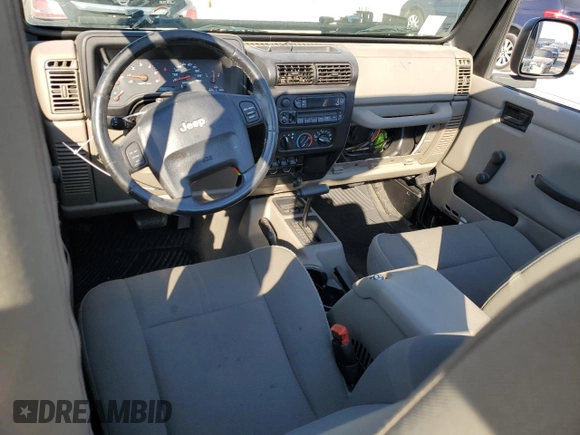 2004 Jeep Wrangler Sahara with VIN 1J4FA59S04P772756, listed as a Copart auction lot 47973495 with 92,685 mi miles and Salvage Title. Bid and sale history available at DreamBid. Image 8.
