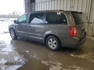 2010 Dodge Grand Caravan SXT with VIN 2D4RN5D1XAR268587, listed as a Copart auction lot 55072485 with 322,312 mi miles and Non Repairable. Bid and sale history available at DreamBid. Image 2.