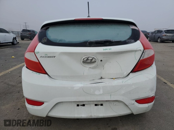 2016 Hyundai Accent Sport with VIN KMHCU5AE3GU239968, listed as a Copart auction lot 82190874 with 59,532 mi miles and Salvage Title. Bid and sale history available at carsss.com. Image 6.