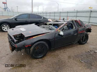 1984 Pontiac Fiero z VIN 1G2AF37R1EP332654, wystawiony jako Copart lot #80316524 z przebiegiem 198 999 mil mil oraz Czysty tytuł • Clean title. Historia ofert i sprzedaży dostępna na DreamBid. Obrazek 1.