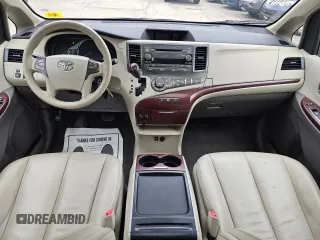 2011 Toyota Sienna XLE AAS with VIN 5TDYK3DCXBS099901, listed as a Copart auction lot 51174615 with 131,795 mi miles and Clean Title. Bid and sale history available at carsss.com. Image 7.