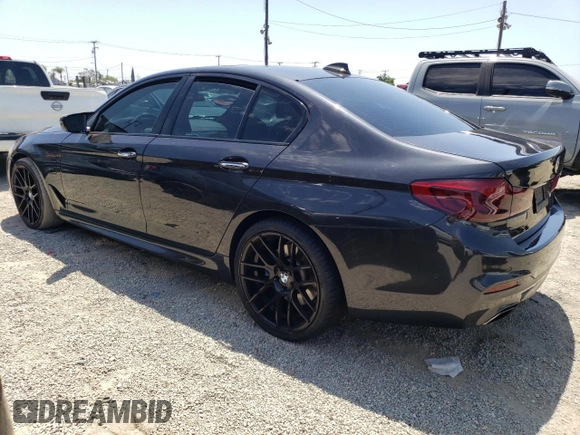 2018 BMW 5 Series 530e with VIN WBAJA9C55JG623181, listed as a Copart auction lot 61593983 with 63,577 mi miles and . Bid and sale history available at DreamBid. Image 2.