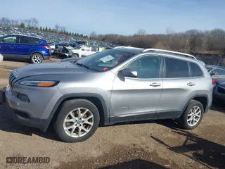 2016 Jeep Cherokee 75th Anniversary with VIN 1C4PJLCB6GW190050, listed as a IAAI auction lot 41341184 with 234,466 mi miles. Bid and sale history available at carsss.com. Image 14.