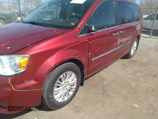 2014 Chrysler Town & Country Limited with VIN 2C4RC1GG5ER463952, listed as a IAAI auction lot 41825303 with 150,131 mi miles and . Bid and sale history available at DreamBid. Image 6.