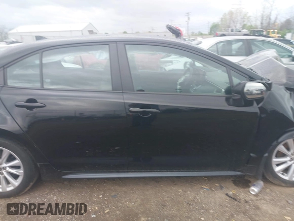 2023 Toyota Corolla LE with VIN 5YFB4MDE1PP058774, listed as a IAAI auction lot 42068978 with 19,802 mi miles and . Bid and sale history available at DreamBid. Image 13.