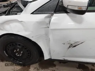 2012 Ford Focus SE с VIN 1FAHP3F21CL301085, выставлен на аукционе IAAI как лот 42321328 с пробегом 157 818 миль миль и . История ставок и продаж доступна на DreamBid. Изображение 6.