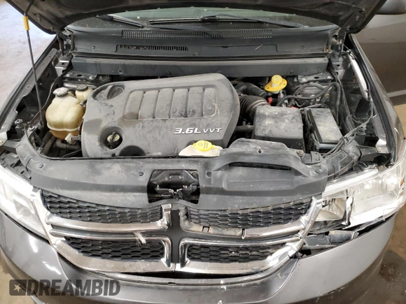 2015 Dodge Journey SXT with VIN 3C4PDCCG9FT722284, listed as a Copart auction lot 84937724 with 210,747 mi miles and Salvage title. Bid and sale history available at DreamBid. Image 12.