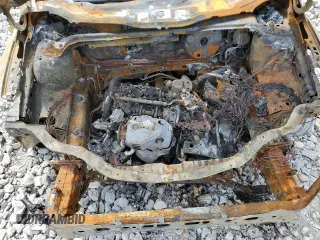 2018 Ford Focus SE z VIN 1FADP3FE4JL265608, wystawiony jako Copart lot #50029575 z przebiegiem Nie podano mil oraz Szkoda całkowita • Salvage title. Historia ofert i sprzedaży dostępna na DreamBid. Obrazek 11.