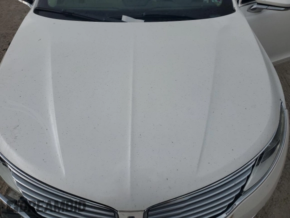 2014 Lincoln MKZ z VIN 3LN6L2GK9ER825882, wystawiony jako Copart lot #53332435 z przebiegiem 114 677 mil mil oraz Szkoda całkowita • Salvage title. Historia ofert i sprzedaży dostępna na DreamBid. Obrazek 11.