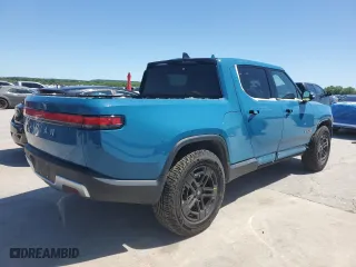2022 Rivian R1T Adventure Package with VIN 7FCTGAAA4NN016700, listed as a Copart auction lot 49730914 with 33,339 mi miles and Clean Title. Bid and sale history available at carsss.com. Image 3.