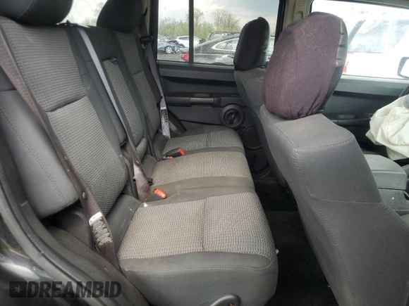 2008 Jeep Commander Sport z VIN 1J8HG48KX8C149885, wystawiony jako Copart lot #55042915 z przebiegiem 243 357 mil mil oraz Czysty tytuł • Clean title. Historia ofert i sprzedaży dostępna na DreamBid. Obrazek 11.