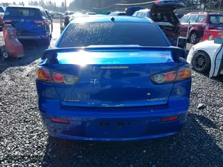 2011 Mitsubishi Lancer ES with VIN JA32U2FU8BU042901, listed as a IAAI auction lot 41450601 with 161,129 mi miles. Bid and sale history available at carsss.com. Image 16.