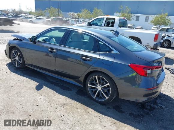 2023 Honda Civic Sedan Touring with VIN 2HGFE1F91PH310656, listed as a IAAI auction lot 41884334 with 17,691 mi miles. Bid and sale history available at carsss.com. Image 3.
