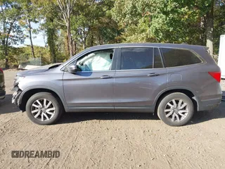 2020 Honda Pilot EX-L z VIN 5FNYF6H53LB069677, wystawiony jako IAAI lot #40581586 z przebiegiem 21 717 mil mil oraz . Historia ofert i sprzedaży dostępna na DreamBid. Obrazek 15.