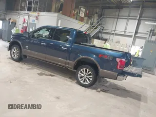 2015 Ford F-150 XLT with VIN 1FTEW1EG4FFB88589, listed as a IAAI auction lot 41877036 with 211,155 mi miles. Bid and sale history available at carsss.com. Image 3.