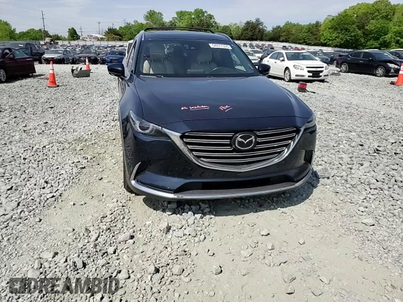 2016 Mazda CX-9 Grand Touring with VIN JM3TCBDY0G0116686, listed as a Copart auction lot 54077335 with 142,670 mi miles and Salvage title. Bid and sale history available at DreamBid. Image 14.