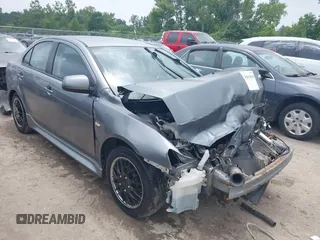 2014 Mitsubishi Lancer ES with VIN JA32U2FU8EU018991, listed as a IAAI auction lot 42663638 with 145,313 mi miles and . Bid and sale history available at DreamBid. Image 1.