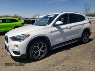 2019 BMW X1 xDrive28i z VIN WBXHT3C51K3H35953, wystawiony jako Copart lot #54751675 z przebiegiem 54 802 mil mil oraz Szkoda całkowita • Salvage title. Historia ofert i sprzedaży dostępna na DreamBid. Obrazek 1.