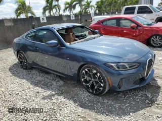 2025 BMW 4 Series 430i with VIN WBA43DA07SCU37586, listed as a Copart auction lot 52437105 with 812 mi miles and Salvage title. Bid and sale history available at DreamBid. Image 4.