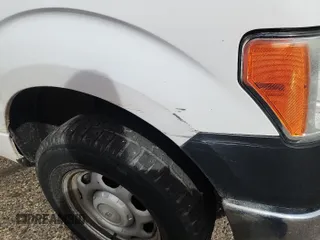 2014 Ford F-150 XL with VIN 1FTFX1EF1EKG55840, listed as a IAAI auction lot 42246556 with 471,369 mi miles and . Bid and sale history available at carsss.com. Image 1.