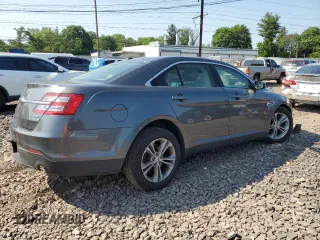2016 Ford Taurus SEL with VIN 1FAHP2E87GG134004, listed as a Copart auction lot 59764905 with 145,169 mi miles and Salvage title. Bid and sale history available at DreamBid. Image 3.