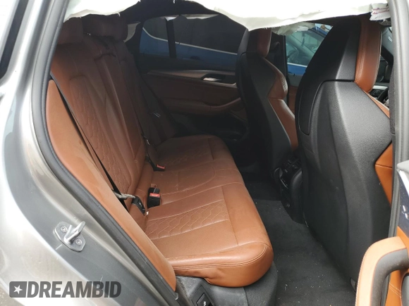 2020 BMW X4 M z VIN 5YMUJ0C09LLU67115, wystawiony jako Copart lot #72729343 z przebiegiem Nie podano mil oraz . Historia ofert i sprzedaży dostępna na DreamBid. Obrazek 11.