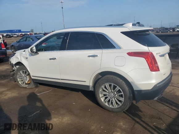 2018 Cadillac XT5 Luxury AWD with VIN 1GYKNDRS2JZ108049, listed as a Copart auction lot 55487815 with 142,632 mi miles and Salvage title. Bid and sale history available at DreamBid. Image 2.