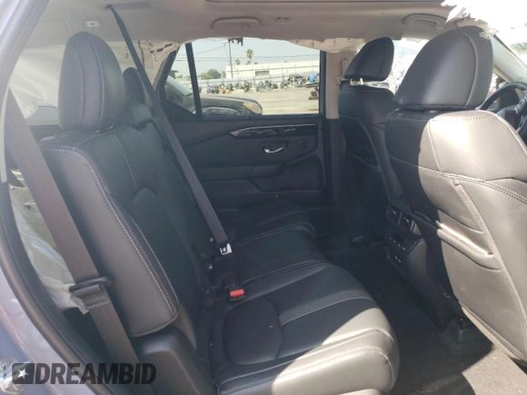 2023 Honda Pilot Touring with VIN 5FNYG2H7XPB011420, listed as a Copart auction lot 69799314 with 9,601 mi miles and Salvage Title. Bid and sale history available at DreamBid. Image 11.