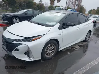 2021 Toyota Prius LE with VIN JTDKAMFP0M3169019, listed as a IAAI auction lot 41481098 with 84,304 mi miles and . Bid and sale history available at DreamBid. Image 2.