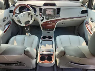 2011 Toyota Sienna XLE with VIN 5TDDK3DC6BS026264, listed as a Copart auction lot 60548865 with 147,516 mi miles and Salvage title. Bid and sale history available at DreamBid. Image 8.
