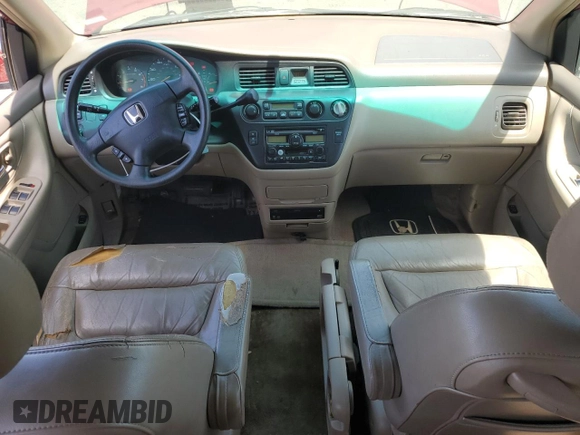 2004 Honda Odyssey EX-L with VIN 5FNRL18014B031578, listed as a Copart auction lot 56938795 with 241,085 mi miles and Salvage title. Bid and sale history available at DreamBid. Image 8.