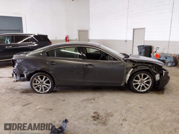 2017 Mazda Mazda6 Touring with VIN JM1GL1V57H1112266, listed as a IAAI auction lot 41553530 with 46,599 mi miles. Bid and sale history available at carsss.com. Image 14.