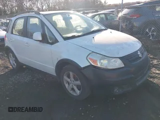 2009 Suzuki SX4 Man AWD with VIN JS2YB413196201614, listed as a IAAI auction lot 41437522 with 999,999 mi miles. Bid and sale history available at carsss.com. Image 1.