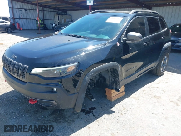 2019 Jeep Cherokee Trailhawk Elite with VIN 1C4PJMBX0KD198328, listed as a IAAI auction lot 42085194 with 76,312 mi miles and . Bid and sale history available at DreamBid. Image 18.