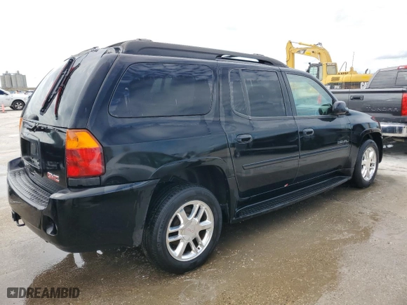 2006 GMC Envoy XL Denali with VIN 1GKES66M066115382, listed as a Copart auction lot 64031054 with 222,143 mi miles and Salvage Title. Bid and sale history available at carsss.com. Image 3.