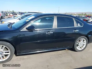 2013 Chevrolet Impala LTZ with VIN 2G1WC5E3XD1208357, listed as a IAAI auction lot 42053811 with 376,518 mi miles. Bid and sale history available at carsss.com. Image 14.