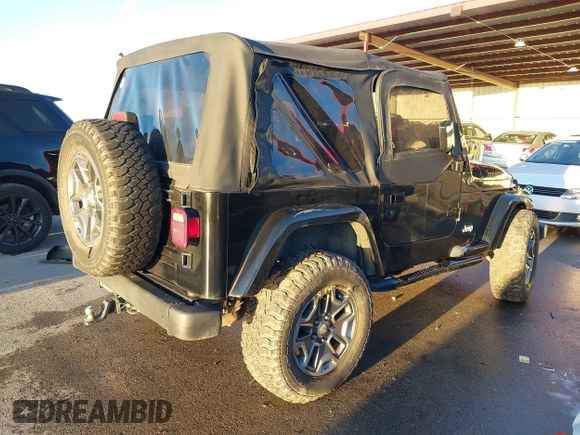 1997 Jeep Wrangler SE with VIN 1J4FY29P0VP415195, listed as a IAAI auction lot 41221078 with 137,046 mi miles. Bid and sale history available at carsss.com. Image 4.