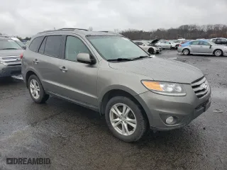 2012 Hyundai Santa Fe SE with VIN 5XYZHDAG5CG143723, listed as a Copart auction lot 52140165 with 321,243 mi miles and Clean Title. Bid and sale history available at carsss.com. Image 4.