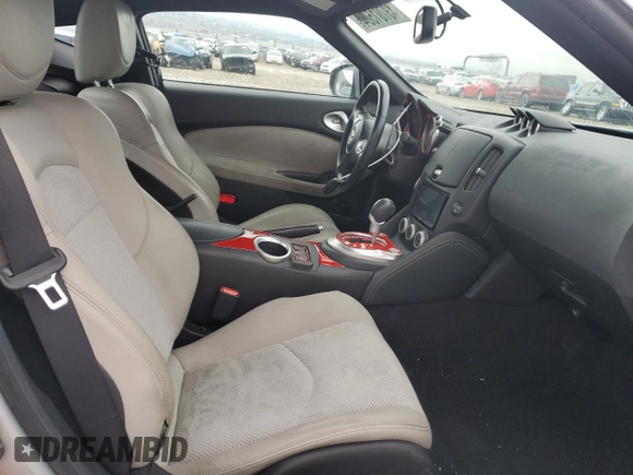 2009 Nissan 370Z Touring with VIN JN1AZ44E89M409220, listed as a Copart auction lot 43701504 with 145,099 mi miles and Salvage Title. Bid and sale history available at carsss.com. Image 10.