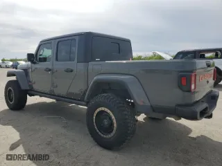 2021 Jeep Gladiator Willys with VIN 1C6HJTAGXML513684, listed as a Copart auction lot 49631835 with 34,998 mi miles and Salvage Title. Bid and sale history available at carsss.com. Image 2.